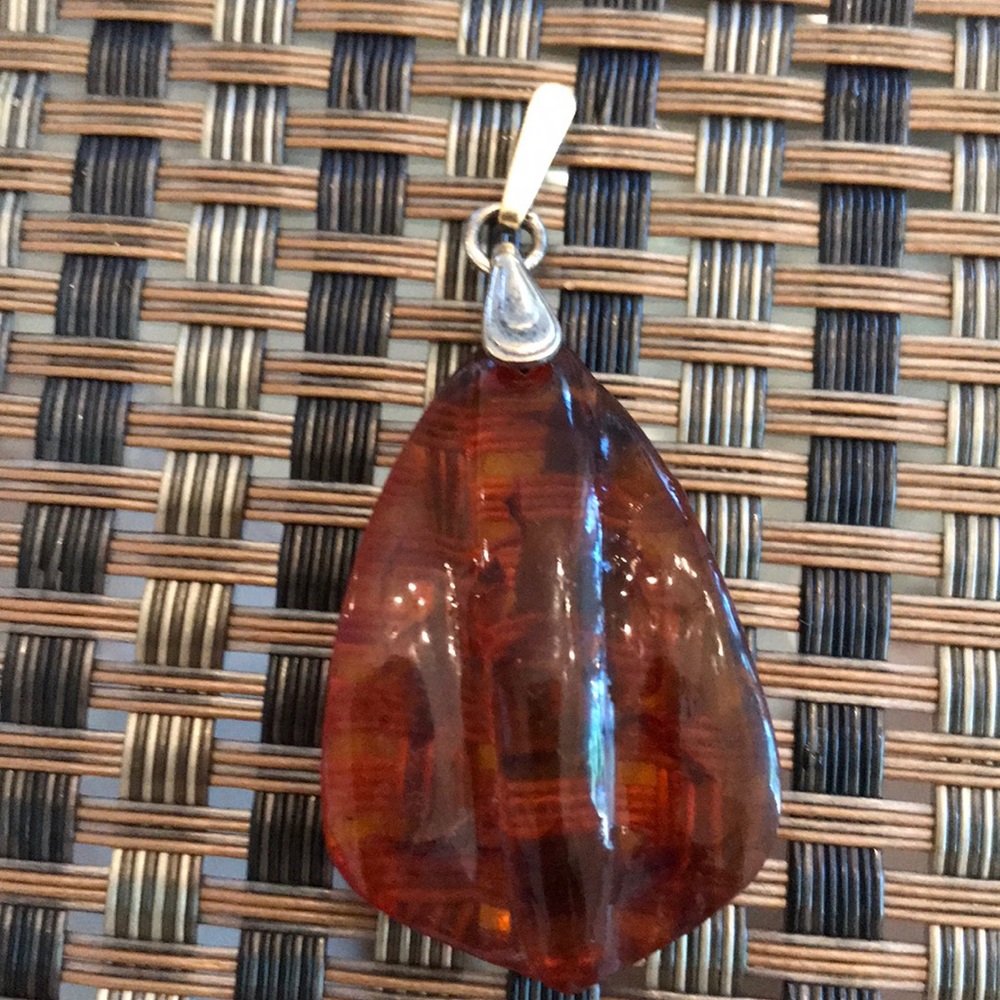 Gorgeous authentic Amber and Sterling Silver pendant.